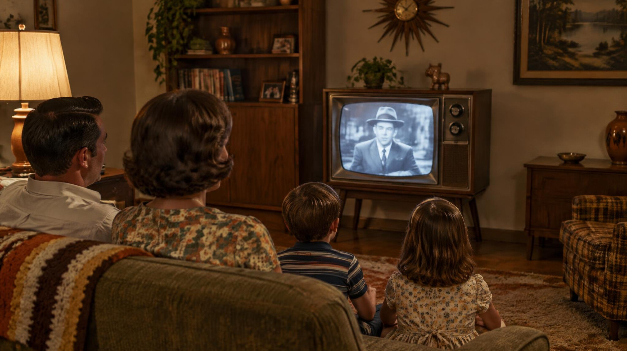 family watching old tv